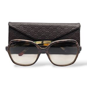 Gucci Women's Sunglasses with Black and Brown Frame
